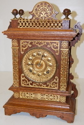 Ansonia Cabinet "F" Clock, Oak W/ Metal Trim — Antique Clocks Price Guide
