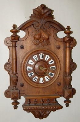 Carved Black Forest Walnut Wall Clock — Antique Clocks Price Guide