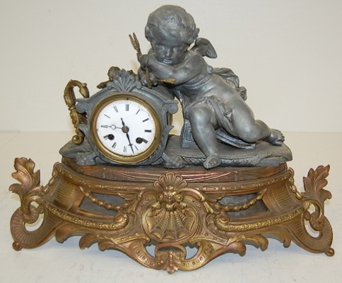 Antique French Clock W/ Cupids and Arrows — Antique Clocks Price Guide