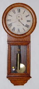 Oak New Haven "Saturn" Weight Wall Clock — Antique Clocks Price Guide