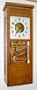 Antique Oak McClintock 30 Day Electric Wall Clock