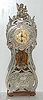 Miniature Lenzkirch Type Art Nouveau Metal Front Clock