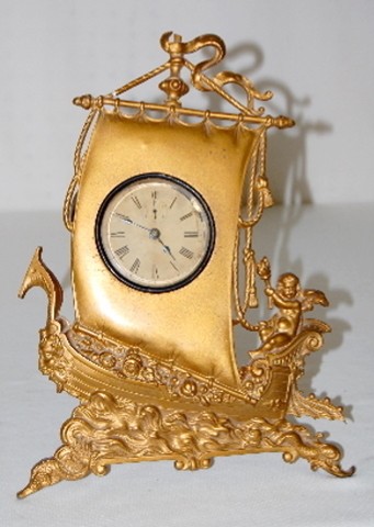 Metal Novelty Ship & Cherub Dresser Clock — Antique Clocks Price Guide