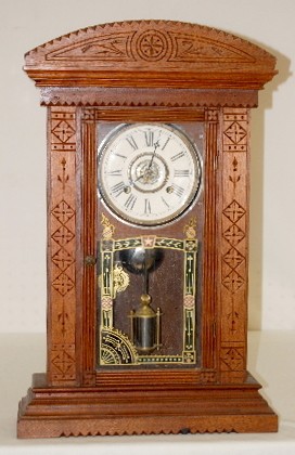 New Haven Walnut "Ganges" Kitchen Clock — Antique Clocks Price Guide