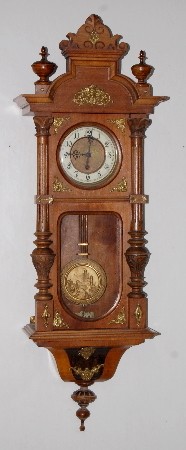 Gustav Becker Carved RA Clock — Antique Clocks Price Guide