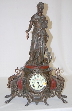 W. L. Gilbert Ornate Metal & Lady Statue Clock — Antique Clocks Price Guide