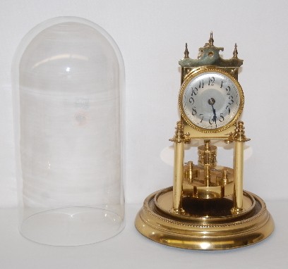 Germany Disk Pendulum Anniversary Clock — Antique Clocks Price Guide