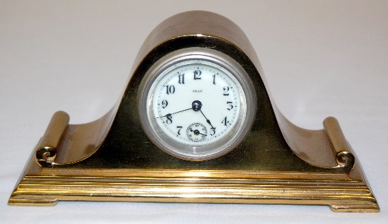 Metal Humback 8 Day Novelty Dresser Clock — Antique Clocks Price Guide