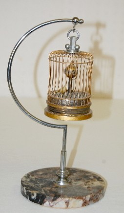 Japan Animated Bird in Cage Clock — Antique Clocks Price Guide