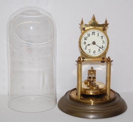 German Disk Pendulum Anniversary Clock — Antique Clocks Price Guide