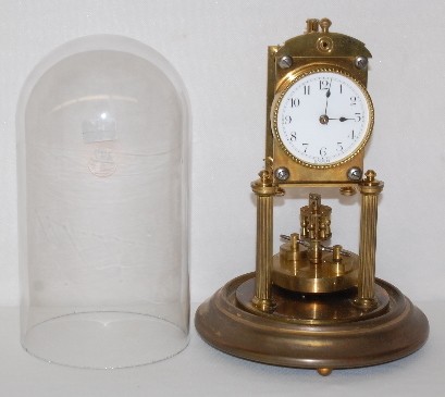 Baden Disk Pendulum Dome Clock — Antique Clocks Price Guide