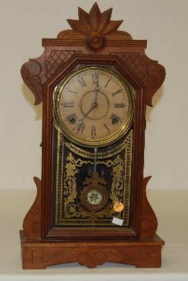 Gilbert Walnut "Arcus" Carved Kitchen Clock — Antique Clocks Price Guide