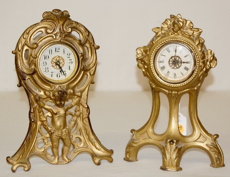 2 Metal Child & Floral — Antique Clocks Price Guide