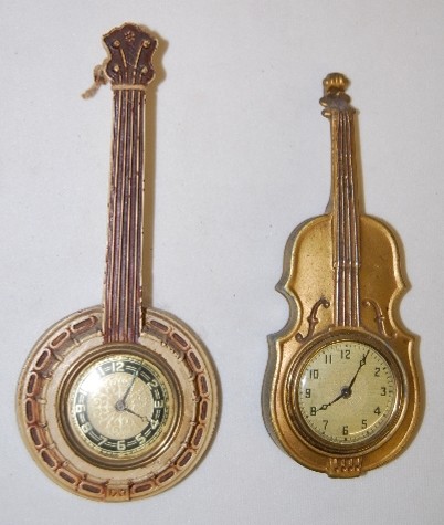 Lux Bird and Metal Novelty Violin Clocks — Antique Clocks Price Guide