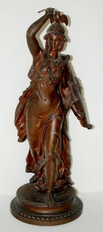 White Metal Female Warrior Clock Statue — Antique Clocks Price Guide