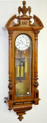 Carved 3 Weight Vienna Wall Clock — Antique Clocks Price Guide