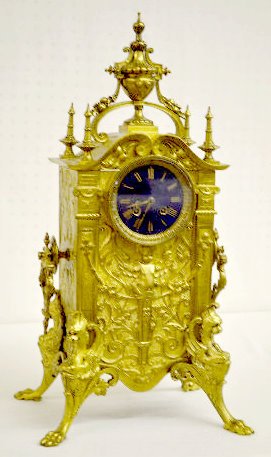 Vincenti Brass Mantel Clock, Angels & Griffins — Antique Clocks Price Guide