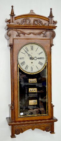 Oak Waterbury "Peoria" Wall Calendar Clock — Antique Clocks Price Guide