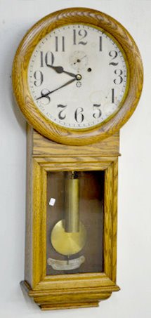 Oak New Haven "Saturn" Weight Clock — Antique Clocks Price Guide