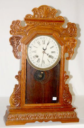 Waterbury Oak "Rochester" Calendar Clock — Antique Clocks Price Guide