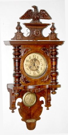 Carved German Free Swinger Clock w/Eagle — Antique Clocks Price Guide