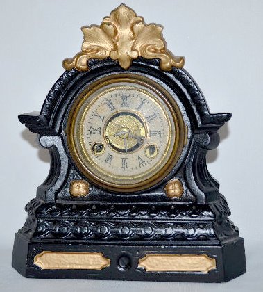 Terry Clock Co. Iron Case Novelty Alarm Clock — Antique Clocks Price Guide