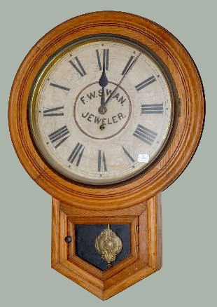 Waterbury Oak Advertising Short Drop Clock — Antique Clocks Price Guide