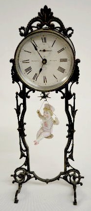 Ansonia "Bobbing Doll" Metal Clock — Antique Clocks Price Guide