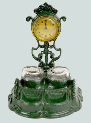 Lux Clock w/Verona Cast Iron Inkwell Stand — Antique Clocks Price Guide