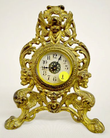 WCMC Cherub Metal Dresser Clock — Antique Clocks Price Guide