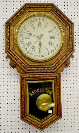 New Haven "Bank" Pressed Oak Calendar Clock — Antique Clocks Price Guide