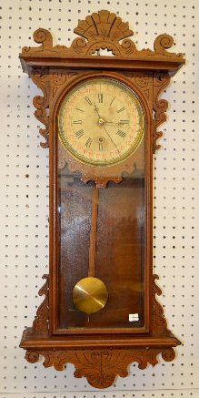 EN Welch "Eclipse" Walnut Calendar Clock — Antique Clocks Price Guide