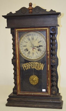 Gilbert "Perfection" Walnut Calendar Clock — Antique Clocks Price Guide