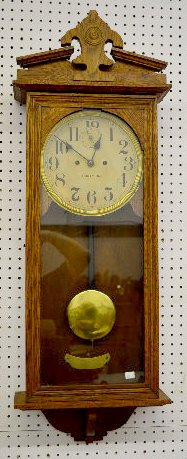 New Haven "Vamoose" Oak Hanging Clock — Antique Clocks Price Guide