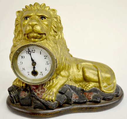 Reproduction Bradley & Hubbard Animated Eye Lion Clock — Antique Clocks Price Guide