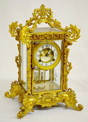 Waterbury "Nevers" Gilt Crystal Regulator — Antique Clocks Price Guide