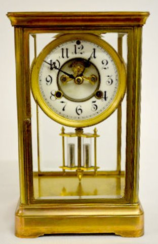 Waterbury "Ostend" Brass Crystal Regulator Clock — Antique Clocks Price Guide