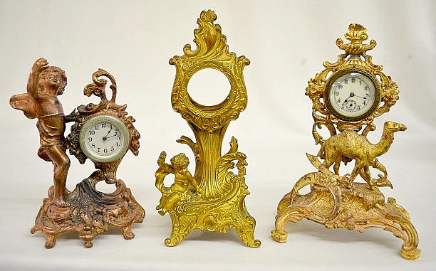 2 Novelty Clocks, Cherub, Camel & 1 Cherub Case Only — Antique Clocks Price Guide