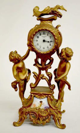 New Haven Double Dial Cherub Novelty Clock — Antique Clocks Price Guide