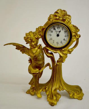 New Haven Dinsmore Cherub Novelty Clock — Antique Clocks Price Guide