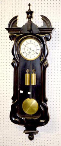 Two-Weight Serpentine German Wall Clock — Antique Clocks Price Guide