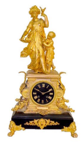 French Brass and Onyx T&S Statue Clock — Antique Clocks Price Guide