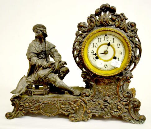 Waterbury Antique Artist Male Statue Clock — Antique Clocks Price Guide